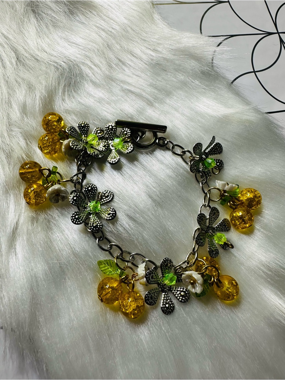 Floral Charm Bracelet with Yellow and Green Accents